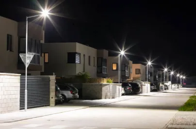 Paved driveway with streetlights